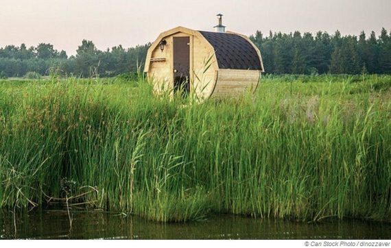 An outdoor - barrel sauna for the garden